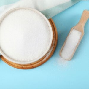 erythritol in a wooden holder with a wooden spoon